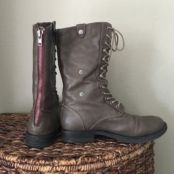 Lace up boot with burgundy zipper on back