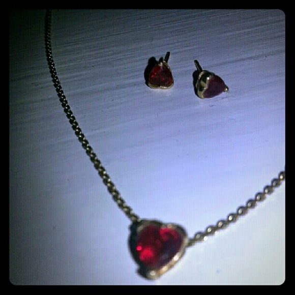 Gold necklace with ruby heart pendant and earrings
