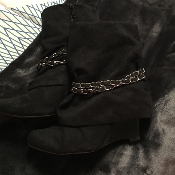 Black zip up booties.