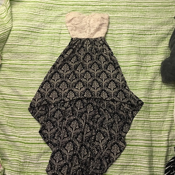 Tiered strapless dress short front long back.