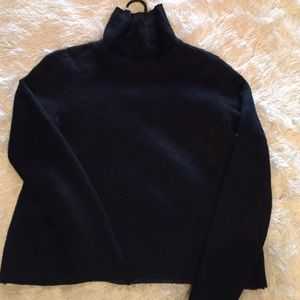 Unique hair-like mock turtleneck