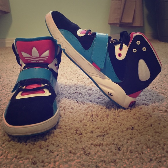 Blue and pink high top adidas