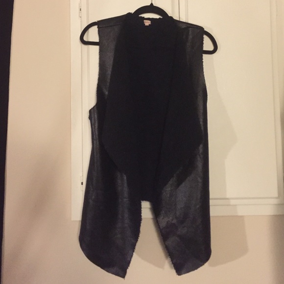 Shiny black sleeveless vest