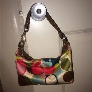 Small multicolored Coach purse