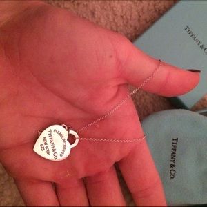Tiffany's necklace in bag and box.