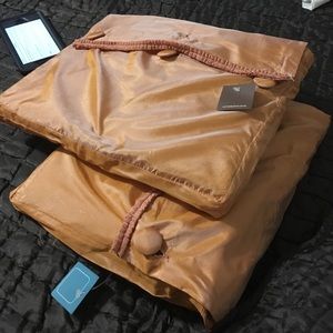 Anthropologie irredesscent window panels.