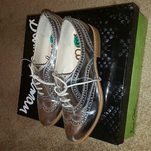 Sam Edelman silver metallic loafers.