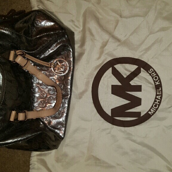 ***SoLD*** Silver metallic MK bag.