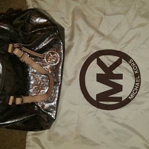 ***SoLD*** Silver metallic MK bag.