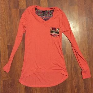 Coral long sleeve v-neck.