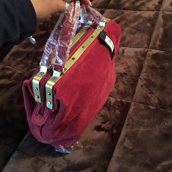 Red/burgundy women's handbag