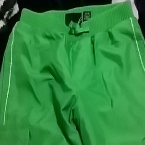 Green athletic pants lined with fleece