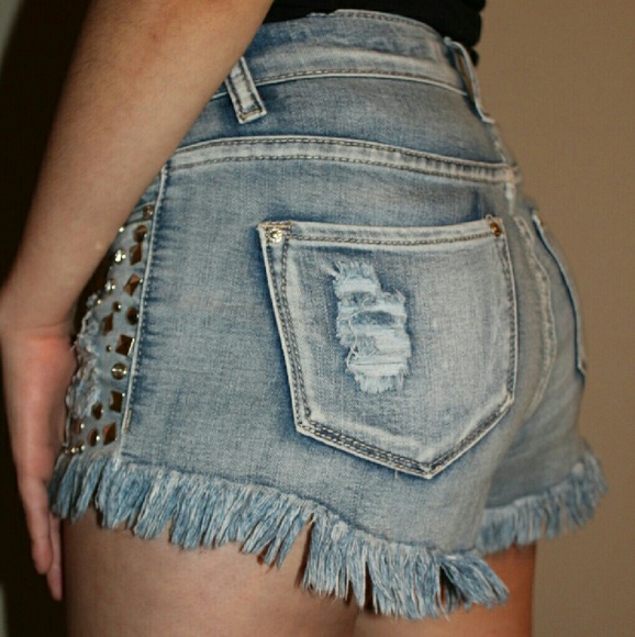 Distressed light jean shorts