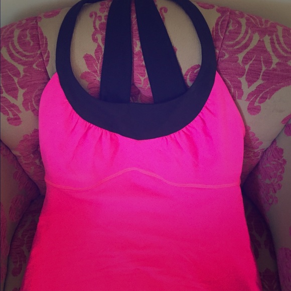 Lululemon size 4 hot pink and black tank.