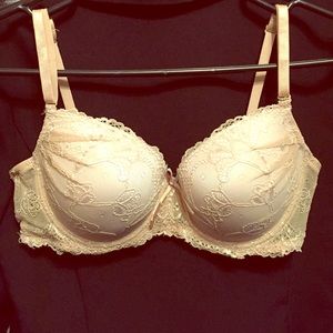Cream/beige lace bra.