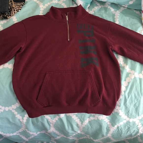 Pink quarter zip with a kangaroo pocket