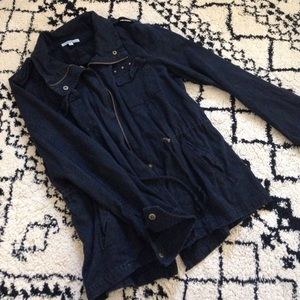Black utility jacket w/ pockets, waist cinch studs