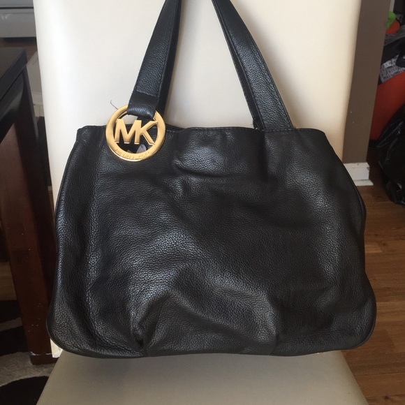 Never before worn Michael Kors Bag!