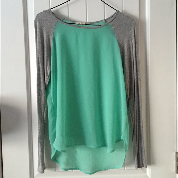 greenish blue/gray shirt