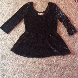 This decree top with a small tutu-like waist skirt