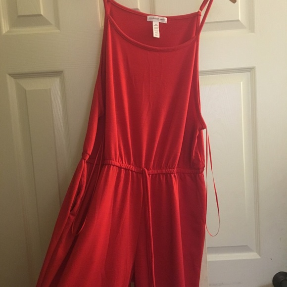Cute jumpsuit never worn, at all.