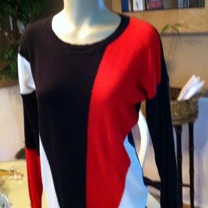 Versatile lightweight sweater. Very flattering!