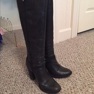 Black below the knee boots