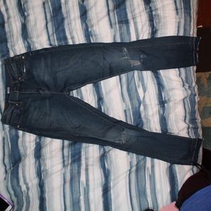 High-Waisted Ripped Jeans