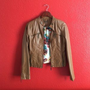 Imitation leather jacket . Gently used