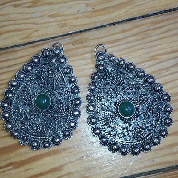 Silver earrings need hooks. Jade stone in center
