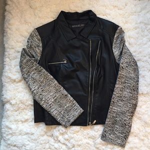 Faux leather jacket with metallic woven sleeves