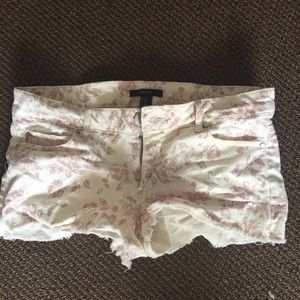 White/pink floral shorts