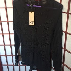 Sheer rope embroidered black long sleeved top
