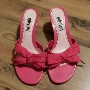 Hot pink sandals.