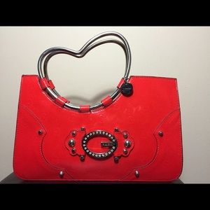 GUSSE red handbag