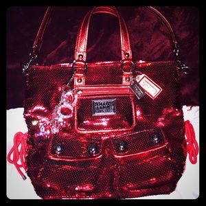 13821-RED COACH SEQUIN POPPY SPOTLIGHT