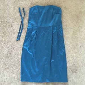 Teal cocktail dress with pockets