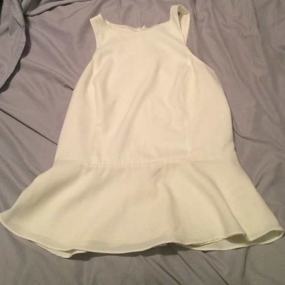 Creme peplum top size m