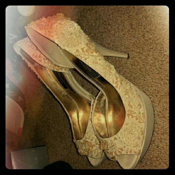 Detailed beaded heels. New