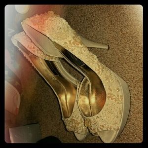 Detailed beaded heels. New