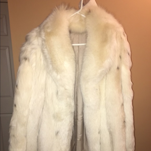 Fox fur 3/4 length coat. Never worn.