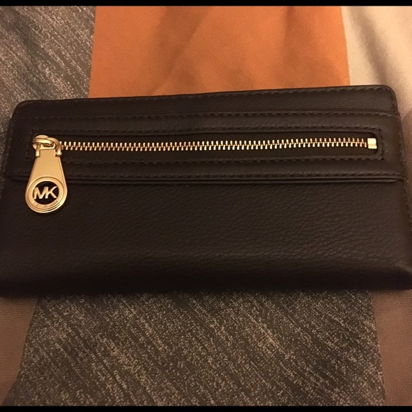 Three compartment  Michael Kors Wallet. Brand New.