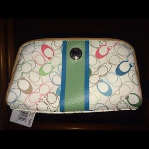 Coach wristlet with tags