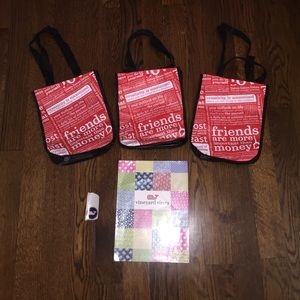 3 lulu lemon bags, 1 vv sticker and 1 vv folder