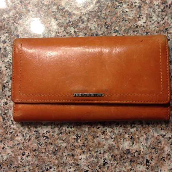 Burnt Orange Fossil Brand leather wallet