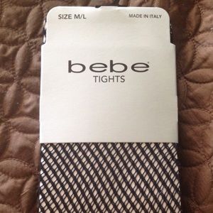 bebe fishnet tights size M/L BNWT