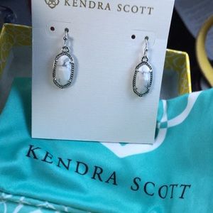 Kendra Scott earrings.
