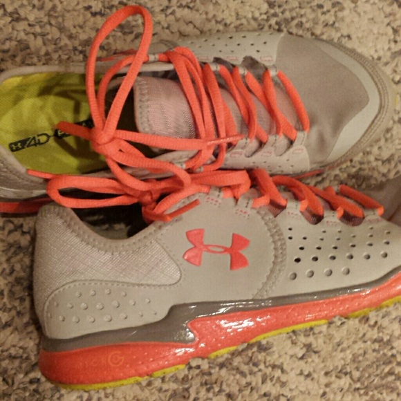 lime and coral under armour shoes.
