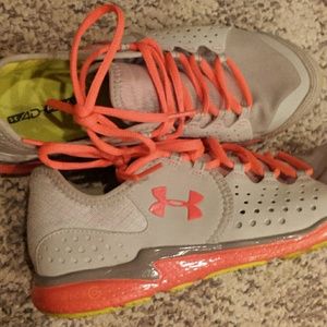 lime and coral under armour shoes.