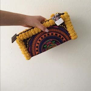 Embroidered clutch